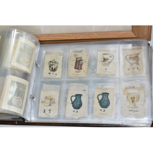 403 - TWO CIGARETTE CARD ALBUMS AND A BOX OF CIGARETTE CARDS containing a miscellaneous collection of sets... 