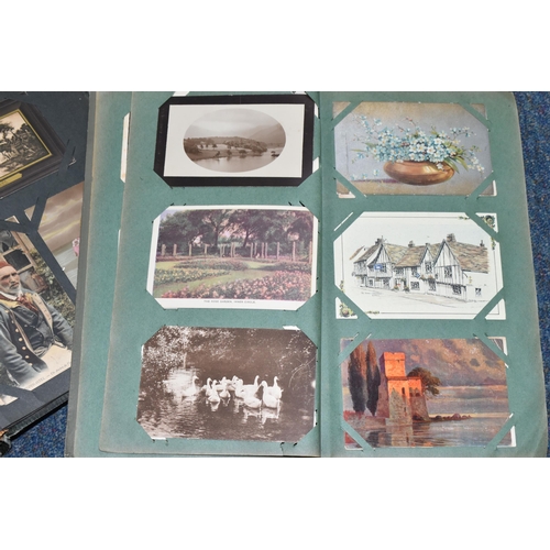 406 - TWO ALBUMS OF POSTCARDS containing approximately 501 early 20th century postcards, (with exceptions)... 