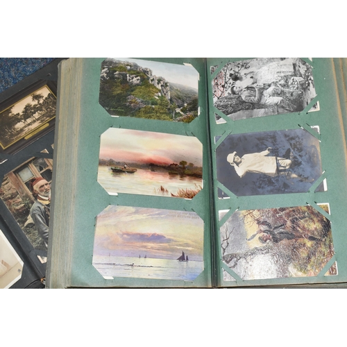 406 - TWO ALBUMS OF POSTCARDS containing approximately 501 early 20th century postcards, (with exceptions)... 