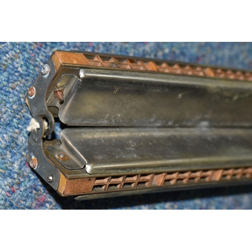 408 - A LONG DOUBLE HARMONICA, German made M. Hohner, length 59cm (1) (Condition Report: missing a few nut... 