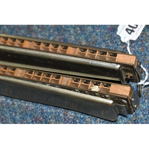 408 - A LONG DOUBLE HARMONICA, German made M. Hohner, length 59cm (1) (Condition Report: missing a few nut... 