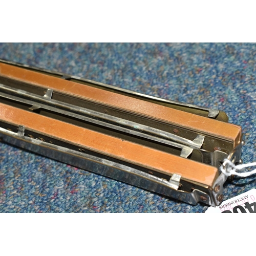 408 - A LONG DOUBLE HARMONICA, German made M. Hohner, length 59cm (1) (Condition Report: missing a few nut... 