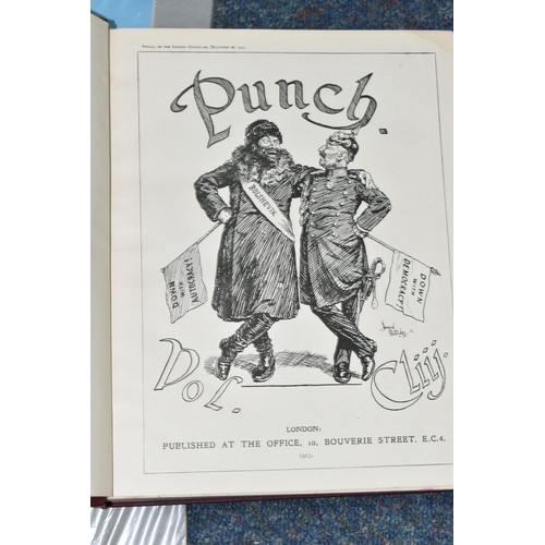 410 - A DUTCH REPRODUCTION WALL CLOCK, an edition of Punch, vol. CLIII July-December 1917 and two mounted ... 