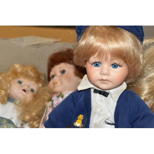 430 - THREE BOXES OF PORCELAIN DOLLS AND BEARS, to include a Merrythoughts jointed bear (playworn), an Aur... 