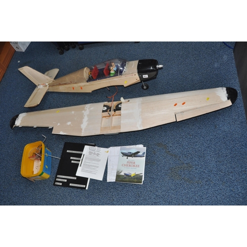 851 - A PIPER CHEROKEE MODEL PLANE, 64in wingspan partially built with spares, manuals and plans (without ... 