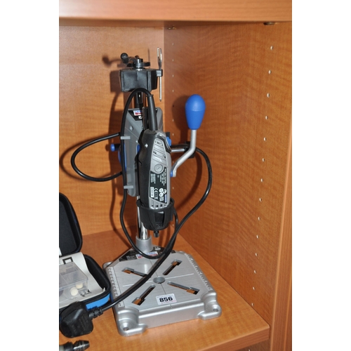 856 - A DREMMEL MODEL 3000 ROTARY TOOLS on a Work Station 200, a Model 300 rotary tool with a flexi shaft,... 