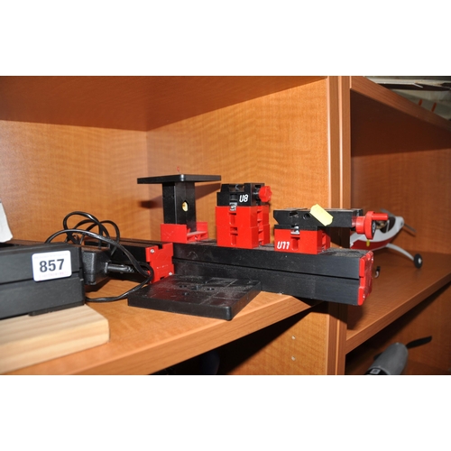 857 - A UNIMAT 1 CLASSIC MODELERS LATHE with metal chuck, motor and power supply along with other accessor... 