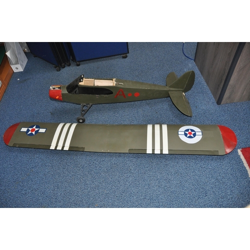 859 - A MAJORITY BUILT J3 BALSA WOOD MODEL PLANE with 118cm wingspan, painted with American Navy decals (n... 