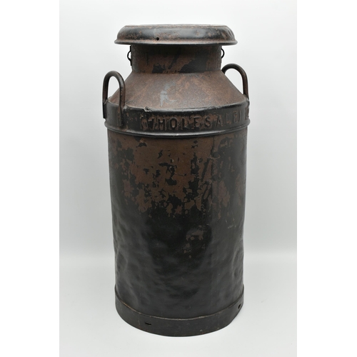 1079A - A BLACK PAINTED METAL 'UNITED DAIRIES WHOLESALE LTD' MILK CHURN, impressed marks to lid 6194 I - U.D... 