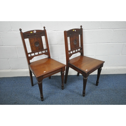 1311 - A PAIR OF EDWARDIAN MAHOGANY HALL CHAIRS, with carved detail to backrest, on fluted front legs (cond... 