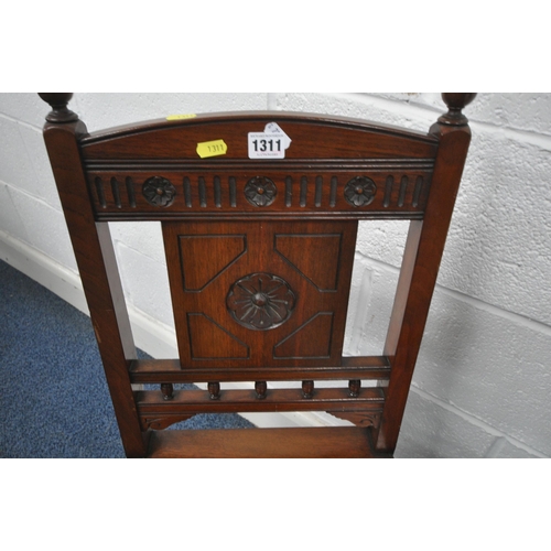 1311 - A PAIR OF EDWARDIAN MAHOGANY HALL CHAIRS, with carved detail to backrest, on fluted front legs (cond... 