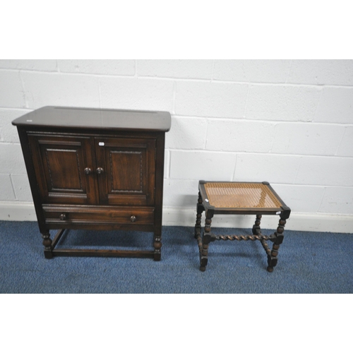 1313 - A DARK ERCOL ELM TWO DOOR CABINET, with a single drawer, width 79cm x depth 43cm x height 88cm, alon... 