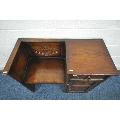 1314 - A 20TH CENTURY SOLID OAK HALL BENCH, with a single drawer and cupboard door, width 89cm x depth 42cm... 