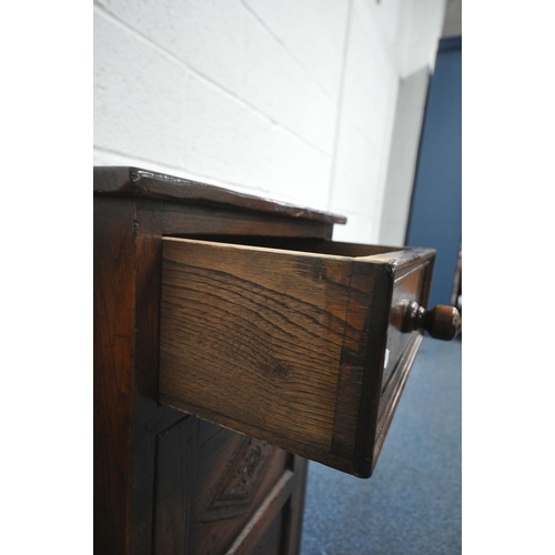 1314 - A 20TH CENTURY SOLID OAK HALL BENCH, with a single drawer and cupboard door, width 89cm x depth 42cm... 