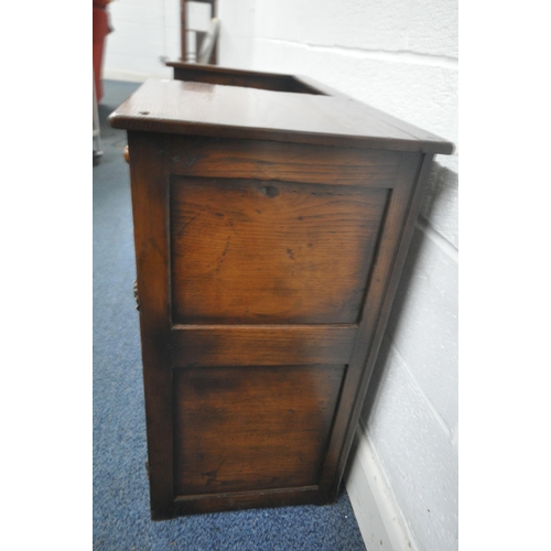 1314 - A 20TH CENTURY SOLID OAK HALL BENCH, with a single drawer and cupboard door, width 89cm x depth 42cm... 