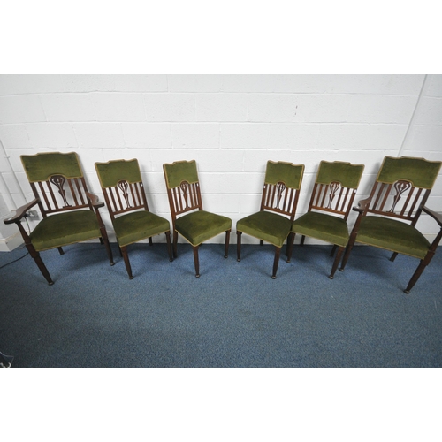 1315 - A SET OF SIX OAK ARTS AND CRAFTS CHAIRS, including two carvers, with green upholstery on turned fron... 