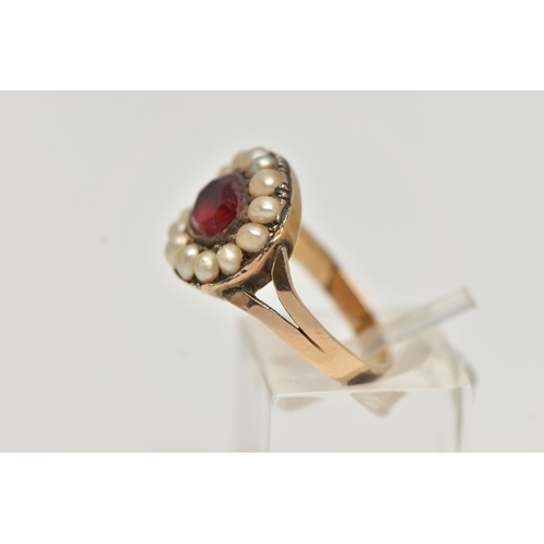 2 - A LATE VICTORIAN PASTE AND SPLIT PEARL RING, designed as a central oval red paste within a split pea... 