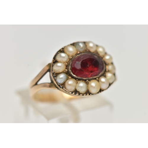 2 - A LATE VICTORIAN PASTE AND SPLIT PEARL RING, designed as a central oval red paste within a split pea... 