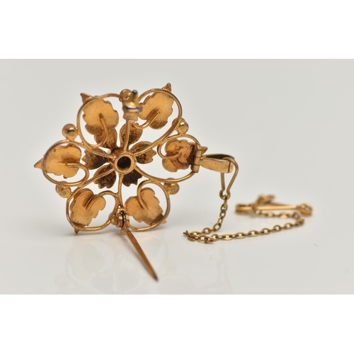 30 - A YELLOW METAL VICTORIAN SEED PEARL BROOCH, open work flower design, set with split and seed pearls,... 