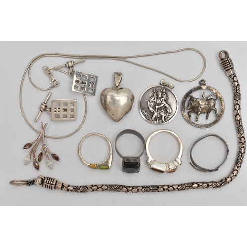 54 - A SMALL BAG OF JEWELLERY, to include a St. Christopher pendant stamped 925, an openwork bull pendant... 