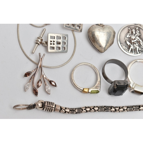 54 - A SMALL BAG OF JEWELLERY, to include a St. Christopher pendant stamped 925, an openwork bull pendant... 