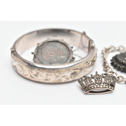 59 - A SELECTION OF SILVER AND WHITE METAL JEWELLERY, to include a hinged bangle, a marcasite crown brooc... 