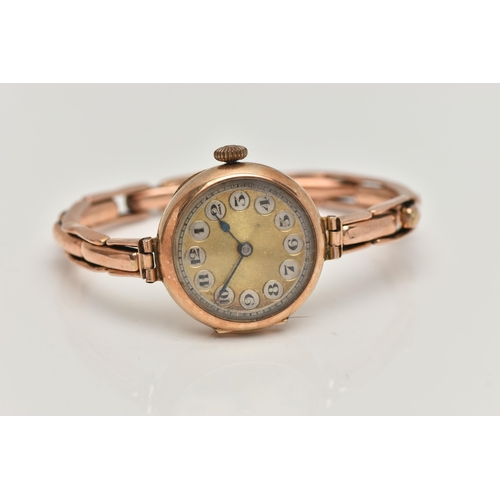 101 - A LADYS EARLY 20TH CENTURY 9CT GOLD WRISTWATCH, manual wind, round gold dial, Arabic numerals, blue ... 