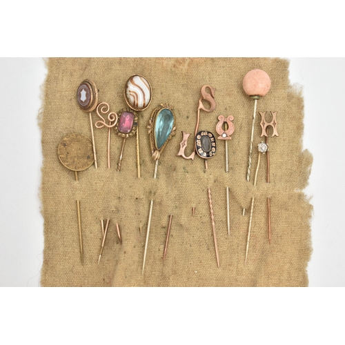 104 - A SELECTION OF STICK PINS, thirteen in total to include a gold plated mourning pin, black enamel sur... 