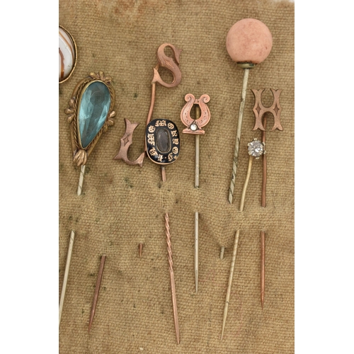 104 - A SELECTION OF STICK PINS, thirteen in total to include a gold plated mourning pin, black enamel sur... 