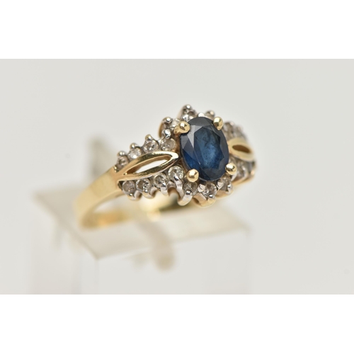 118 - A SAPPHIRE AND DIAMOND RING, designed as a central oval sapphire within a brilliant cut diamond surr... 