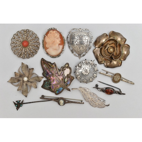 120 - ELEVEN BROOCHES AND A STICKPIN, to include a late Victorian silver circular brooch with butterfly an... 