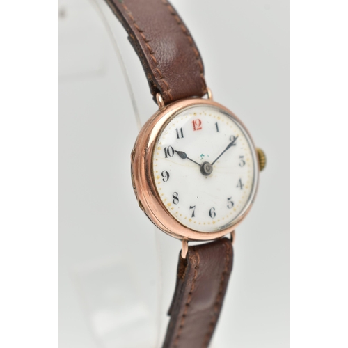 128 - A 9CT GOLD LADYS WRISTWATCH, hand wound movement, round white dial, Arabic numerals, rose gold case,... 
