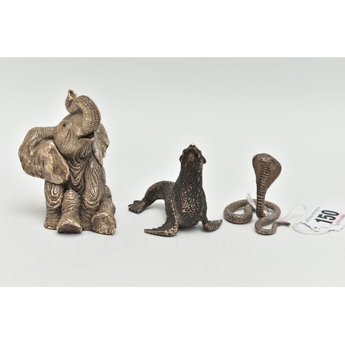150 - THREE ANIMAL ORNAMENTS, the first a filled silver seated elephant, with silver hallmark, the second ... 