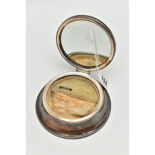 152 - A 1920'S SILVER SMALL JEWELLERY BOX, of circular outline, the hinged lid set with plastic faux torto... 