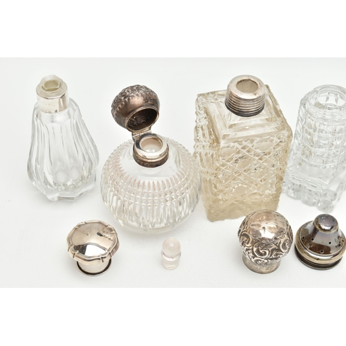 158 - SIX SILVER LIDDED BOTTLES, six glass bottles of varying shapes and size, all fitted with silver lids... 