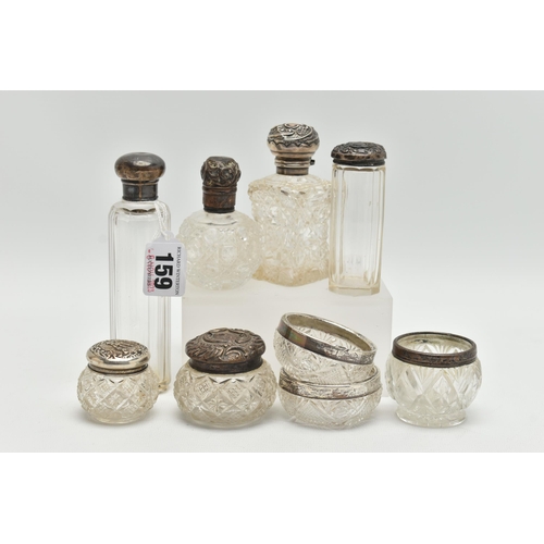 159 - AN ASSORTMENT OF SILVER, to include three small class jars with silver rims, two glass jars fitted w... 