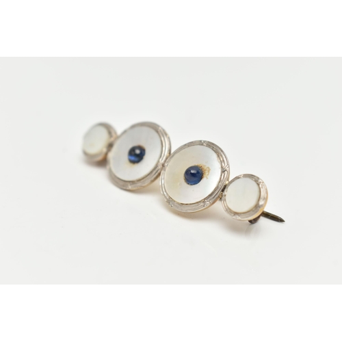 197 - A CONVERSION BROOCH, four mother of pearl white and yellow metal dress studs fitted together, fitted... 