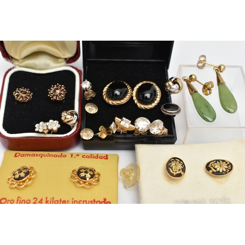 86 - A BAG OF ASSORTED EARRINGS, to include a pair of yellow metal garnet cluster stud earrings, post and... 