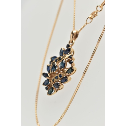 89 - A 9CT GOLD SAPPHIRE PENDANT NECKLACE, abstract pendant set with marquise cut and circular cut blue s... 