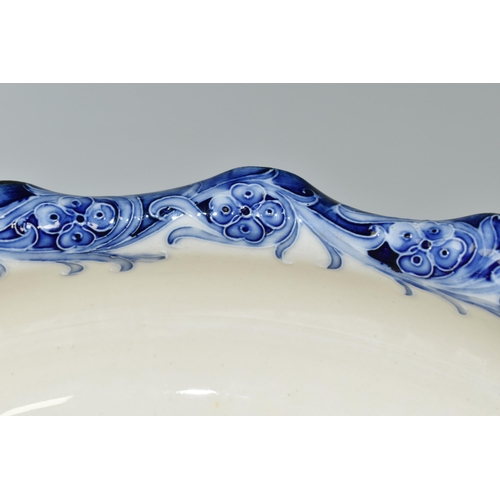 347 - A MOORCROFT MACINTYRE FLORIAN WARE FRUIT BOWL, circa 1900, pattern no. M711, tube line decorated in ... 