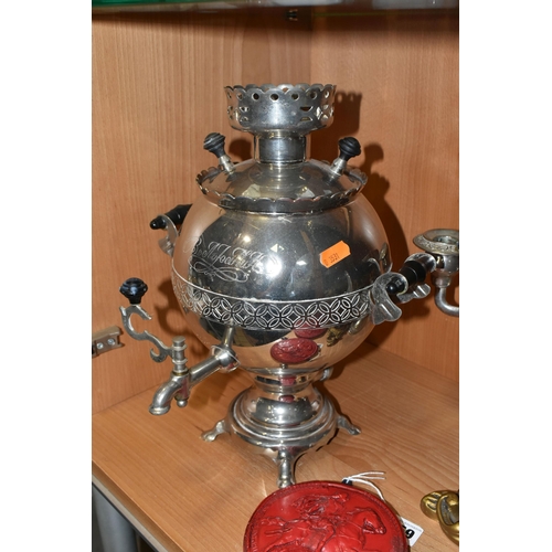 359 - A GROUP OF METALWARE, comprising a Russian electric samovar with plug and wiring 1987 and Russian im... 