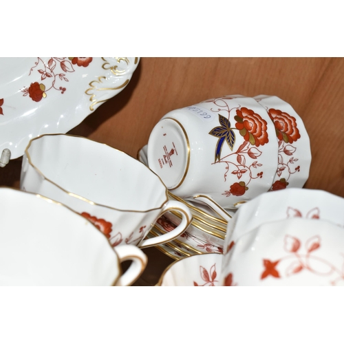 373 - A TWENTY PIECE ROYAL CROWN DERBY 'BALI' TEA SET, pattern no A1100, comprising a cake plate, a cream ... 