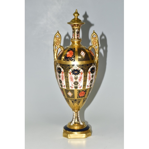 378 - A ROYAL CROWN DERBY 'IMARI 1128 SOLID GOLD' BAND TWIN HANDLED VASE AND FIXED COVER, short pedestal a... 