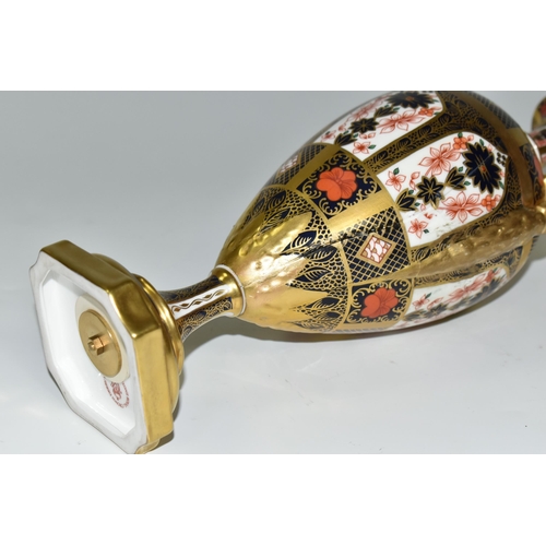 378 - A ROYAL CROWN DERBY 'IMARI 1128 SOLID GOLD' BAND TWIN HANDLED VASE AND FIXED COVER, short pedestal a... 