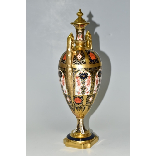 378 - A ROYAL CROWN DERBY 'IMARI 1128 SOLID GOLD' BAND TWIN HANDLED VASE AND FIXED COVER, short pedestal a... 