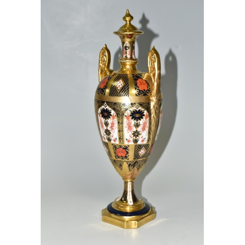 378 - A ROYAL CROWN DERBY 'IMARI 1128 SOLID GOLD' BAND TWIN HANDLED VASE AND FIXED COVER, short pedestal a... 