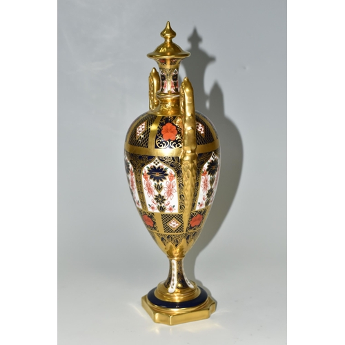 378 - A ROYAL CROWN DERBY 'IMARI 1128 SOLID GOLD' BAND TWIN HANDLED VASE AND FIXED COVER, short pedestal a... 