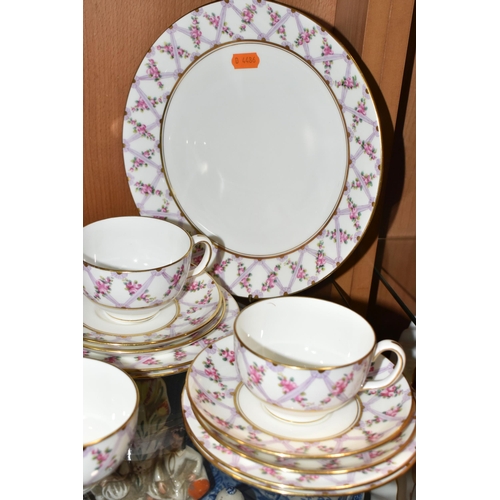 385 - A THIRTY SIX PIECE EARLY TWENTIETH CENTURY MINTON TEA SET, pattern no S50, printed and tinted with p... 