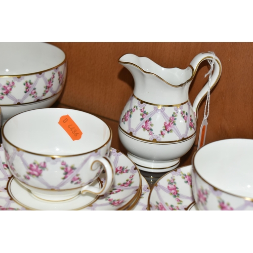 385 - A THIRTY SIX PIECE EARLY TWENTIETH CENTURY MINTON TEA SET, pattern no S50, printed and tinted with p... 