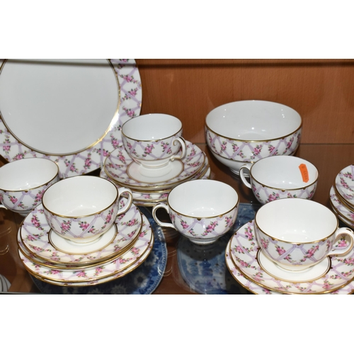 385 - A THIRTY SIX PIECE EARLY TWENTIETH CENTURY MINTON TEA SET, pattern no S50, printed and tinted with p... 